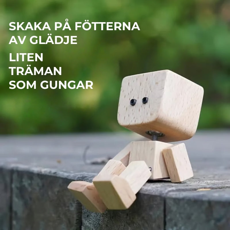 Charmant liten träfigur med 12 magnetiska uttryck
