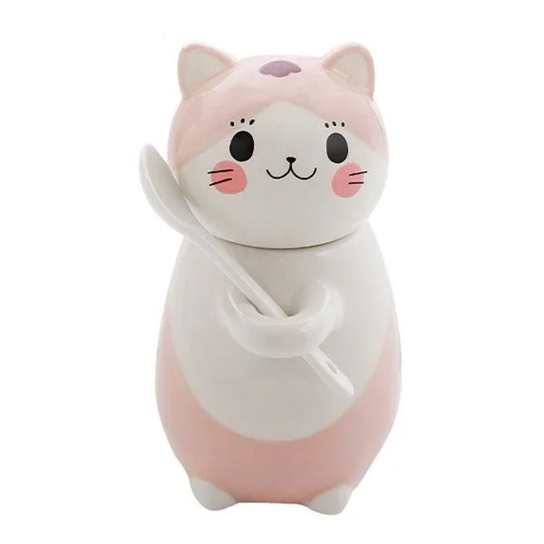 Kattmugg i keramik med sked och lock