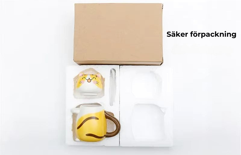 Kattmugg i keramik med sked och lock