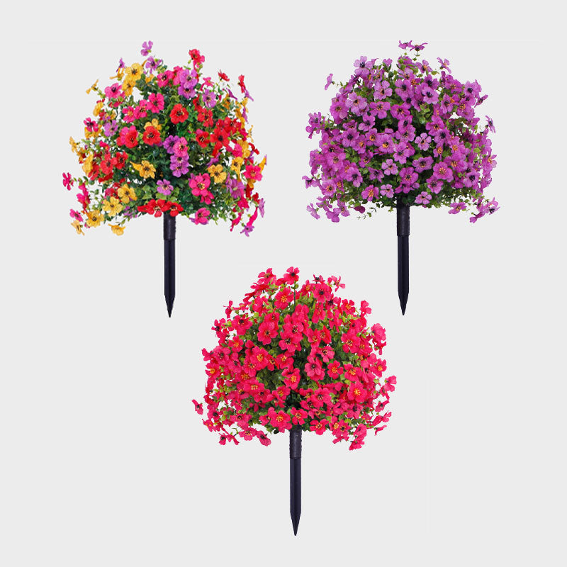 Blomsterarrangemang med konstgjord eukalyptus och violer