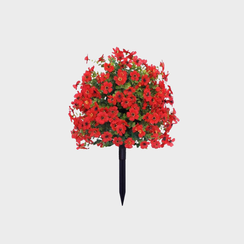 Blomsterarrangemang med konstgjord eukalyptus och violer