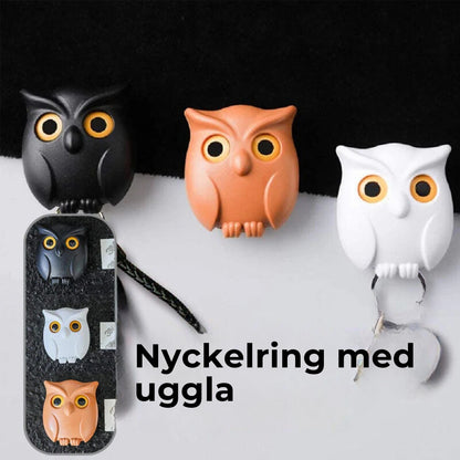 Uggla - nyckelhållare