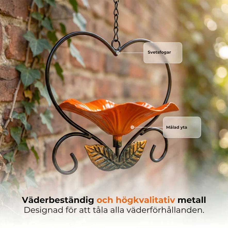 Hängande fågelmatare med blommönster