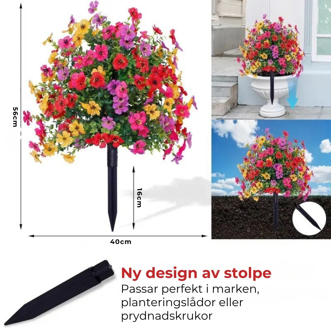 Blomsterarrangemang med konstgjord eukalyptus och violer