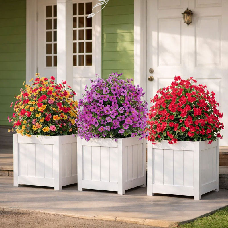 Blomsterarrangemang med konstgjord eukalyptus och violer