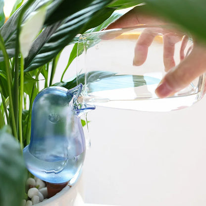 Automatisk bevattning för plantor fågel