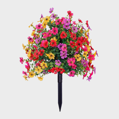 Blomsterarrangemang med konstgjord eukalyptus och violer