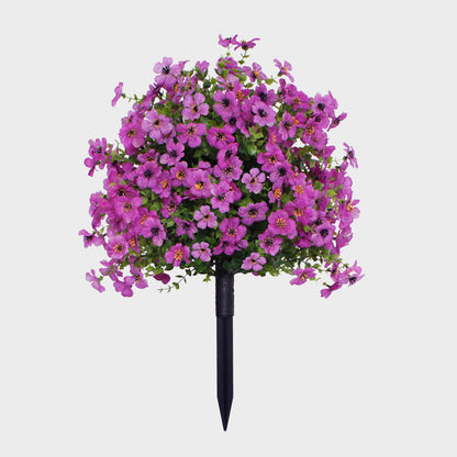 Blomsterarrangemang med konstgjord eukalyptus och violer