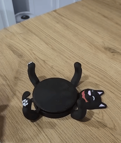 Kattunderlägg med rörliga tassar