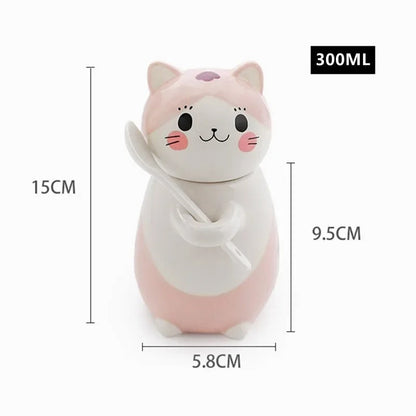 Kattmugg i keramik med sked och lock