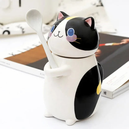 Kattmugg i keramik med sked och lock