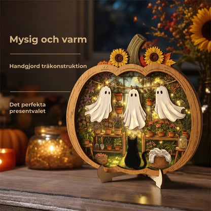 Halloween-dekorationer av trä i form av pumpor
